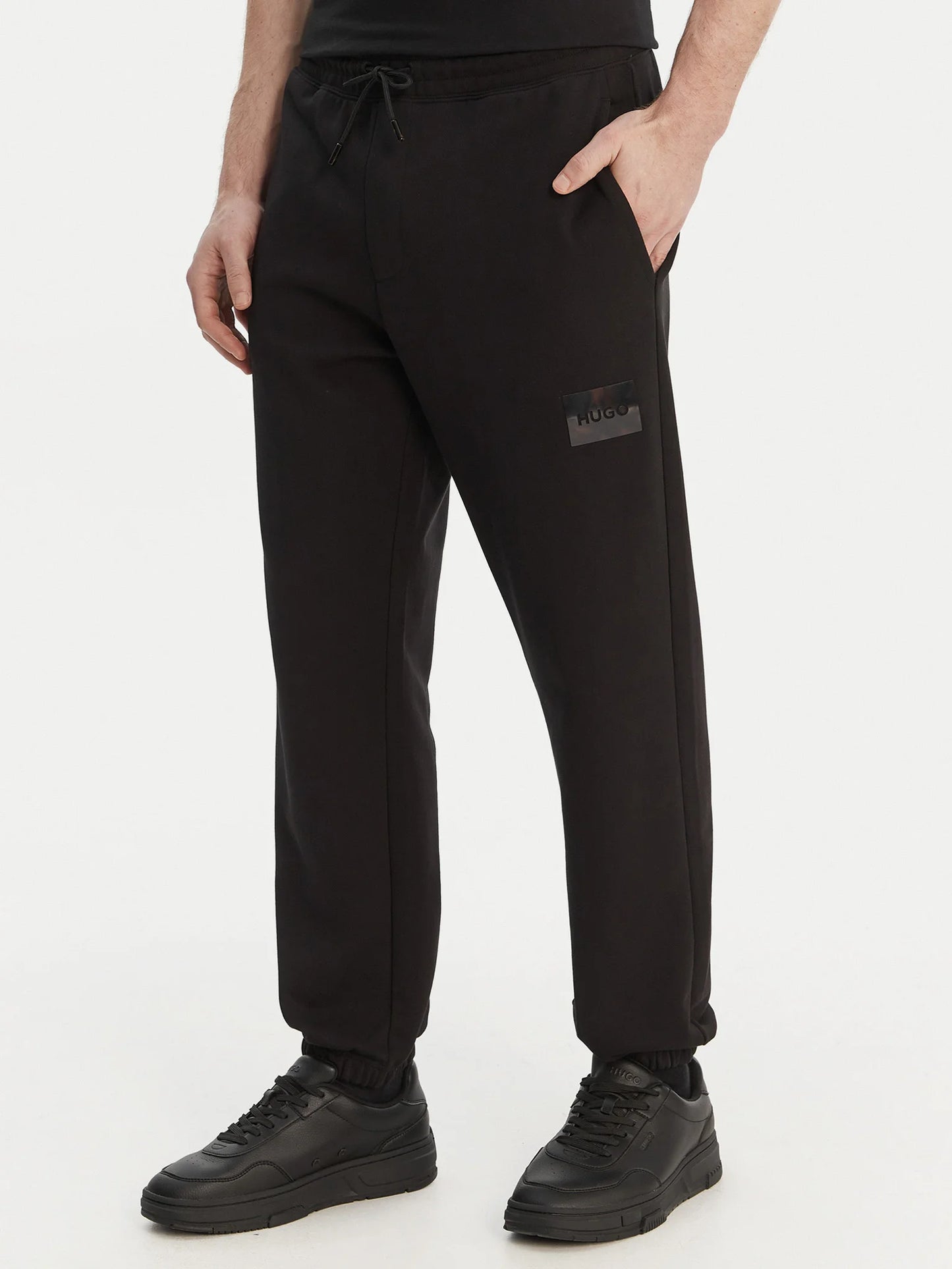 Jogging en molleton avec patch logo écaille de tortue