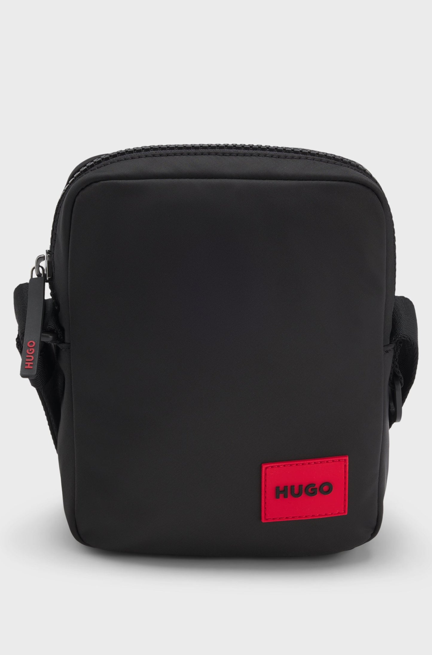 Sac reporter avec étiquette logo caoutchoutée