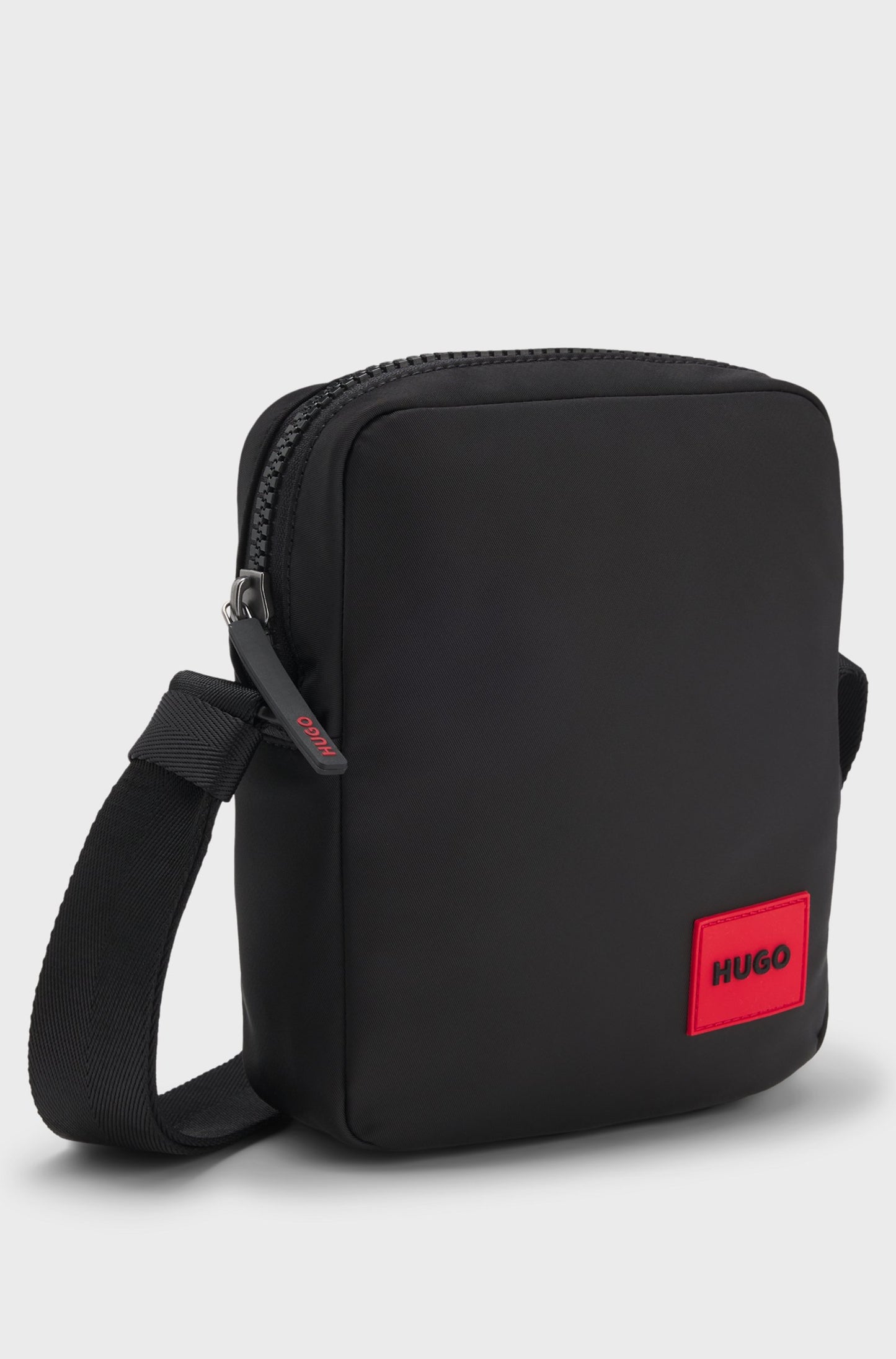 Sac reporter avec étiquette logo caoutchoutée