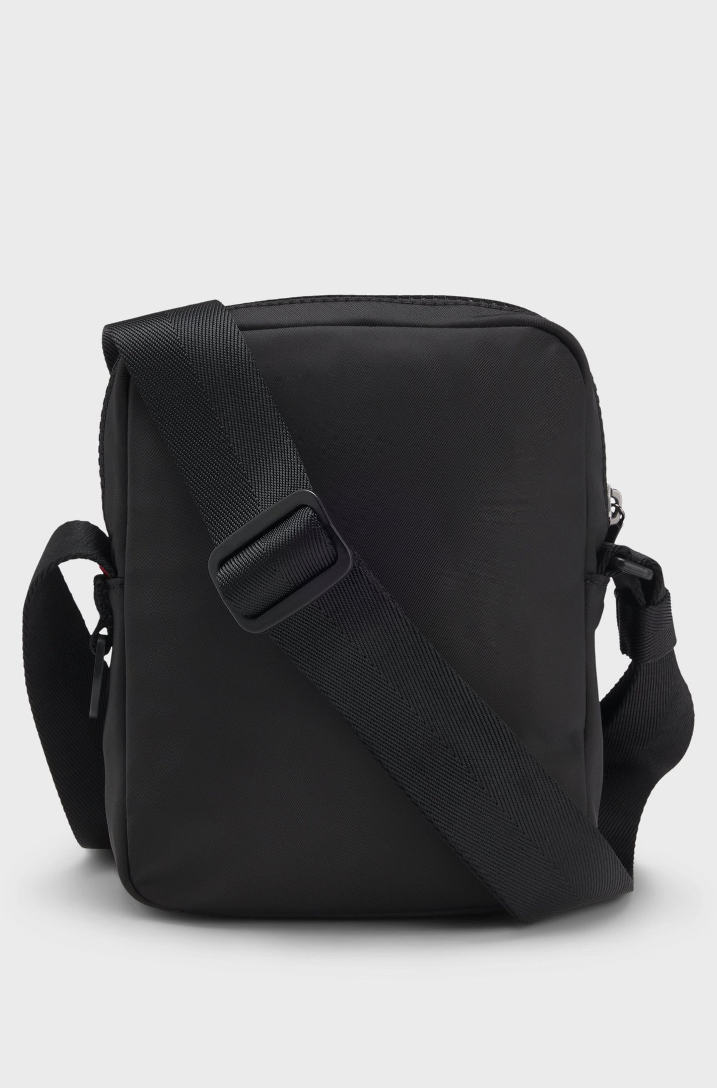 Sac reporter avec étiquette logo caoutchoutée