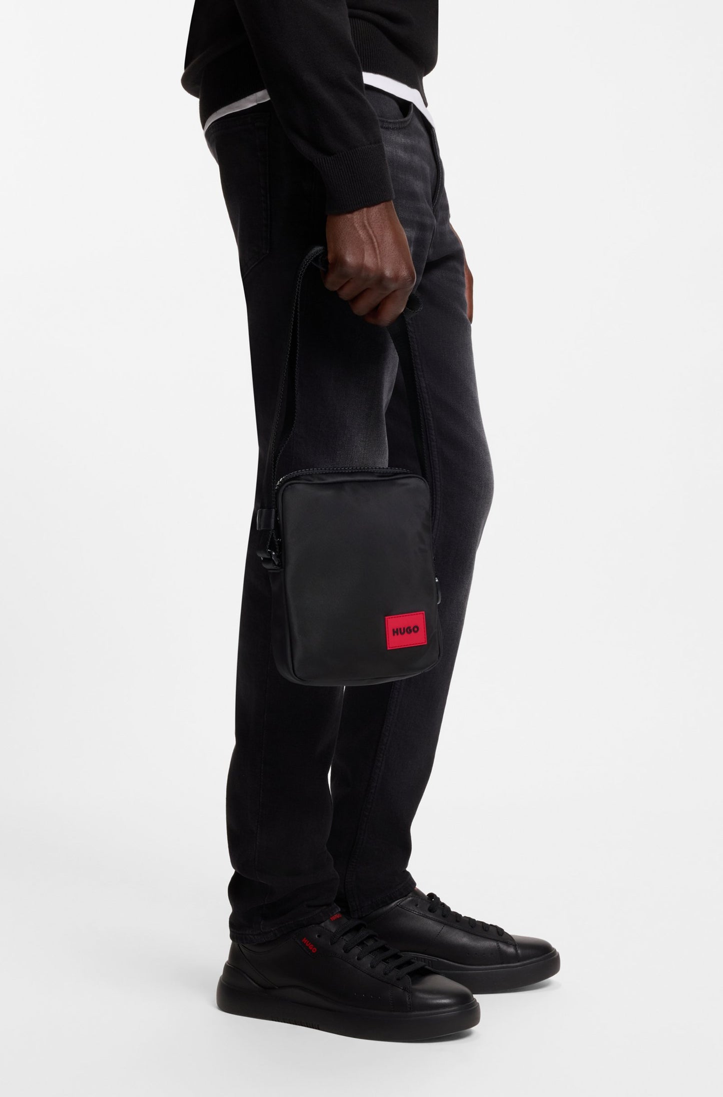 Sac reporter avec étiquette logo caoutchoutée